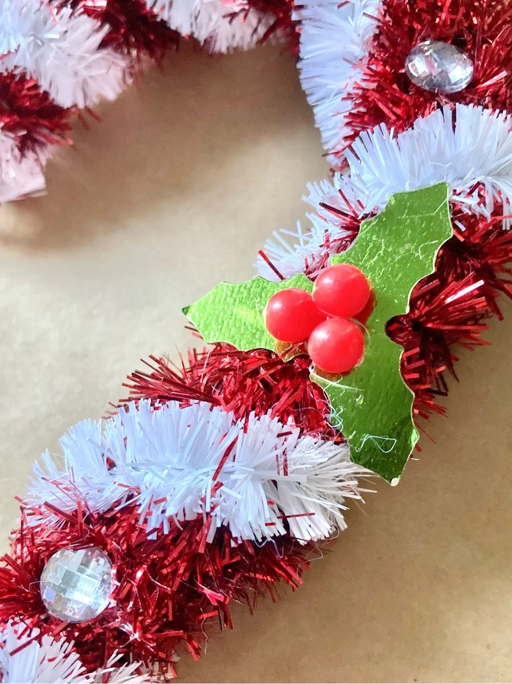 .• Metallic Tinsel Candy Cane Tree Ornament